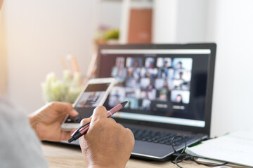 Teacher or Business people Online meeting digital conference  students or office worker. Using smartphone laptop capture while Video call working learning from home. Covid-19 Positive Lifestyle idea