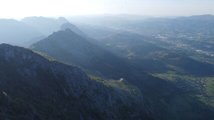 arial view of mountains at sunset in Urkiola Natural Park in the Basque Country, Spain