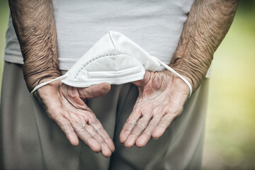 Elderly woman with a face mask