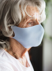Elderly woman with a face mask