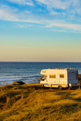 Camper rv camping on sea shore, Spain