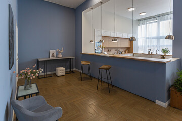 minimalist modern interior design huge bright apartment with an open plan in Scandinavian style in white, blue and dark blue colors with columns in the center. includes kitchen area, office and lounge