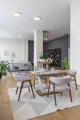 dinnig and kitchen area in minimalist modern interior design huge bright apartment with an open...