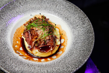 Veal with mashed potatoes and herbs