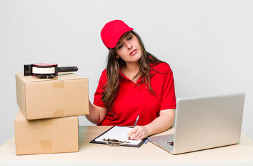 young adult pretty woman. company employee with boxes
