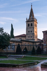 Fototapeta na wymiar Kings garden and Las Pelayas monastery tower at sunset in Oviedo old town.