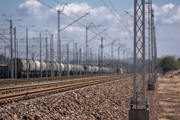 RAILWAY - Infrastructure and tank wagons for the transport of chemical and oil materials in background