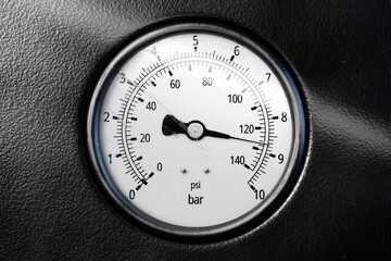 Round temperature gauge isolated on a black panel. Circular barometer or indicator template. 3d illustration