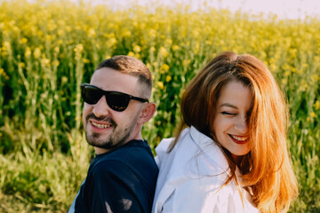 couple hugging on the field