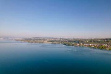 Aerial view from City of Rapperswil-Jona with scenic view of Lake Zürich on a sunny spring day. Photo taken April 28th, 2022, Rapperswil-Jona, Canton St. Gallen, Switzerland.