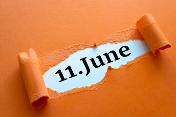 Calendar date. June 11 written under torn paper.