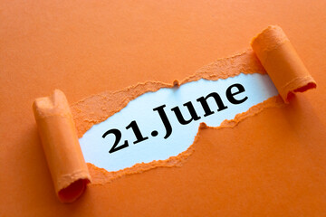 Calendar date. June 21 written under torn paper.