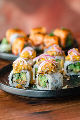 Sushi lifestyle images on the table using a chopstick 
