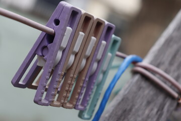 clothes pegs on a blue background