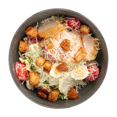 Isolated bowl of caesar salad on white background