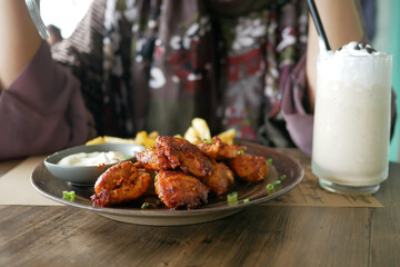 close up of slice of grill chicken on a plate 