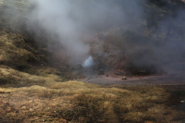 Fototapeta na wymiar a geyser erupting in Yellowstone National Park
