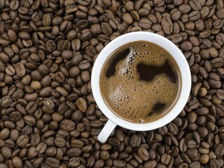 cup of coffee with beans