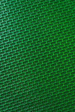 Musical column close-up of green bright color. Texture and background close-up.