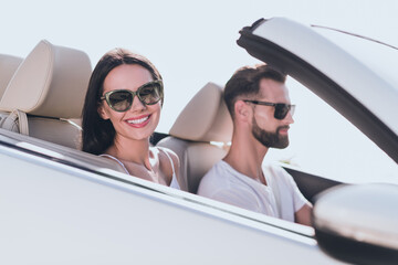 Photo of attractive sweet husband wife wear casual clothes riding cabriolet going summer trip...