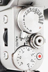 Digital camera exposure mode dials and a release button
