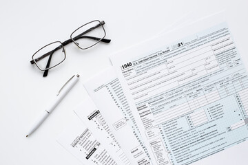 Pen on US individual tax form. Tax payment season