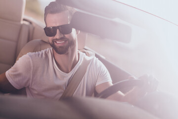 Photo of charming attractive husband wear casual clothes riding cabriolet enjoying sunshine outside countryside
