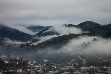 View of the foggy hills and town.