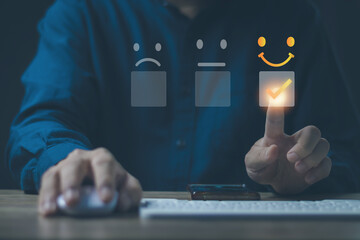 Customer service and Satisfaction concept Men's hands doing online assessments in the satisfaction...