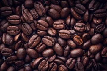 Roasted coffee beans background. Selective focus