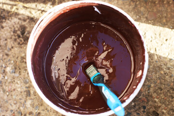 painting the house. paint the boards with a brush.