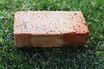 red brick on the grass. construction.