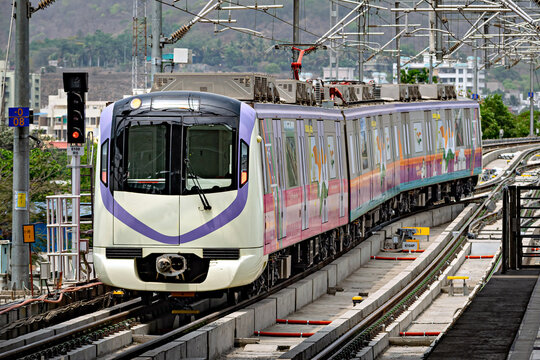 Close up image of Rapid transit metro train entering Vanaz station in Pune. This is a recently started service.