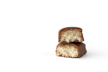 Coconut sweets in chocolate glaze isolated on white background.