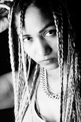 Beautiful woman wearing necklace against black background  , Nikita Dev