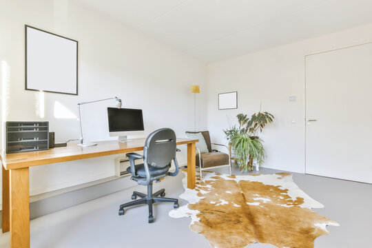 Home office with potted plant