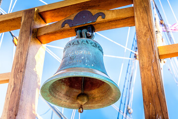 The ship bell of the historic Mayflower in the harbor of Plymouth, Massachusetts - obrazy, fototapety, plakaty