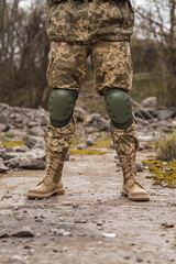 A soldier shod in special tactical khaki shoes