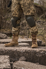 A soldier shod in special tactical khaki shoes