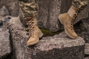 A soldier shod in special tactical khaki shoes