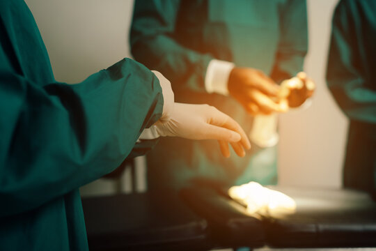 closeup image of nurse wear medical gloves in the operating room.