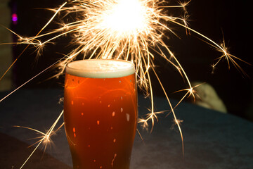 Glass of beer and sparkler