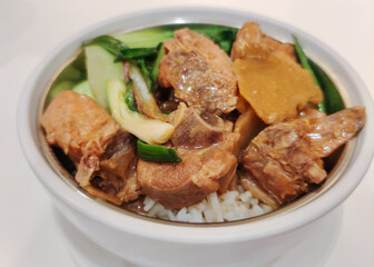 Close-up view of the stir fry with chicken, onions and ginger with rice - Chinese food