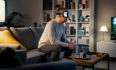 Fototapeta premium Man watching movies in VR
