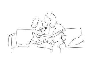 mère et fille sur un canapé entrain de lire une histoire