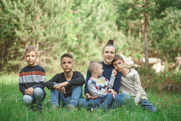 mother with children in a nature park