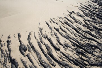 sand dunes lava on the beach volcanic magma lava