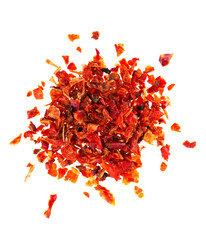 Naklejka premium Dried red paprika flakes isolated on white background. Spices and herbs. Top view.
