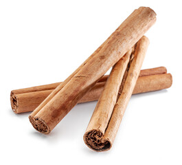 Cinnamon dried bark strips, sweet-smelling brown substance used in cooking, isolated on white background.