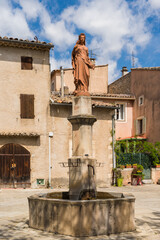 Fountain in the market square of Villars, Vaucluse department, Provence, France